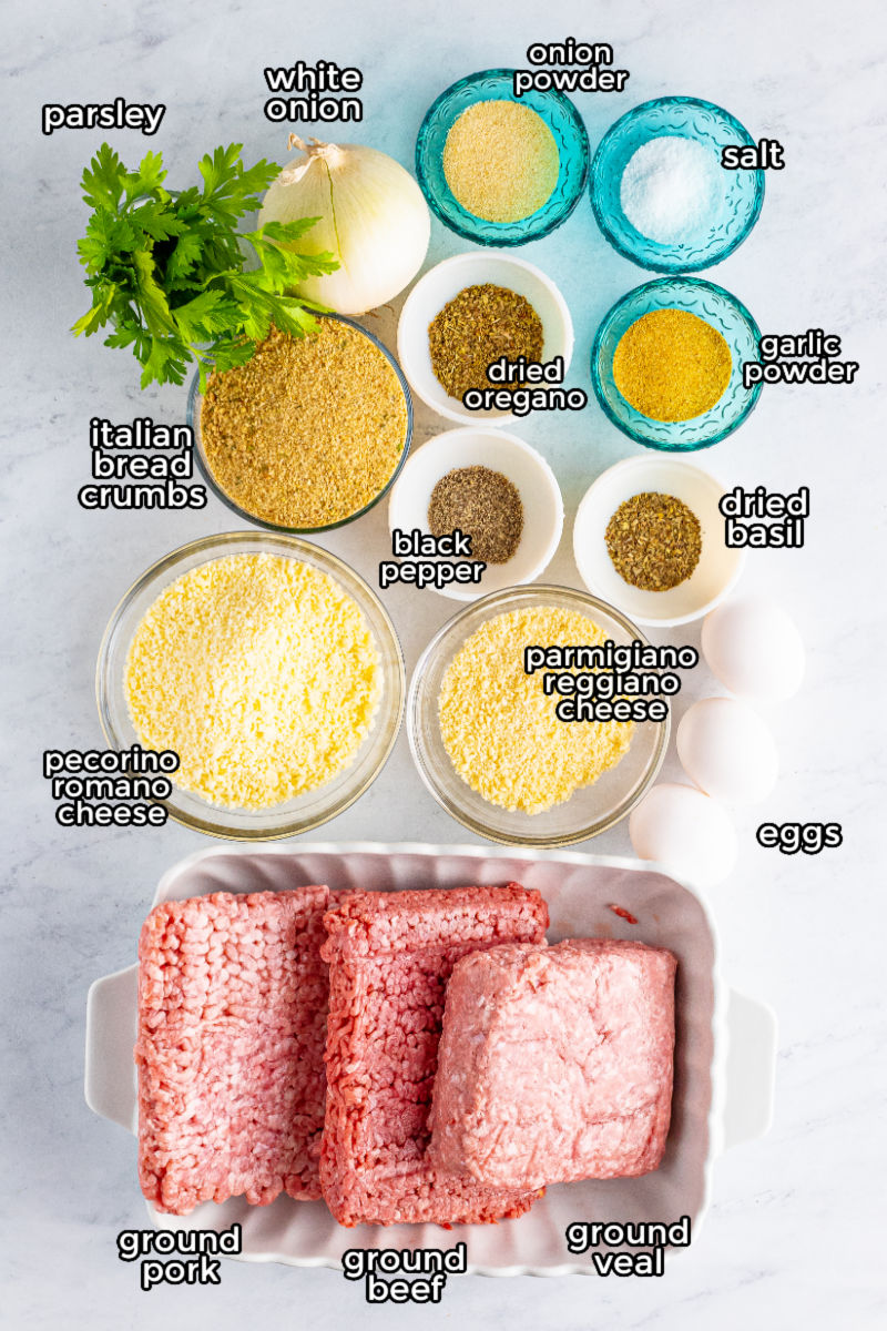 ingredients to make italian meatballs in bowls on a counter with text labels